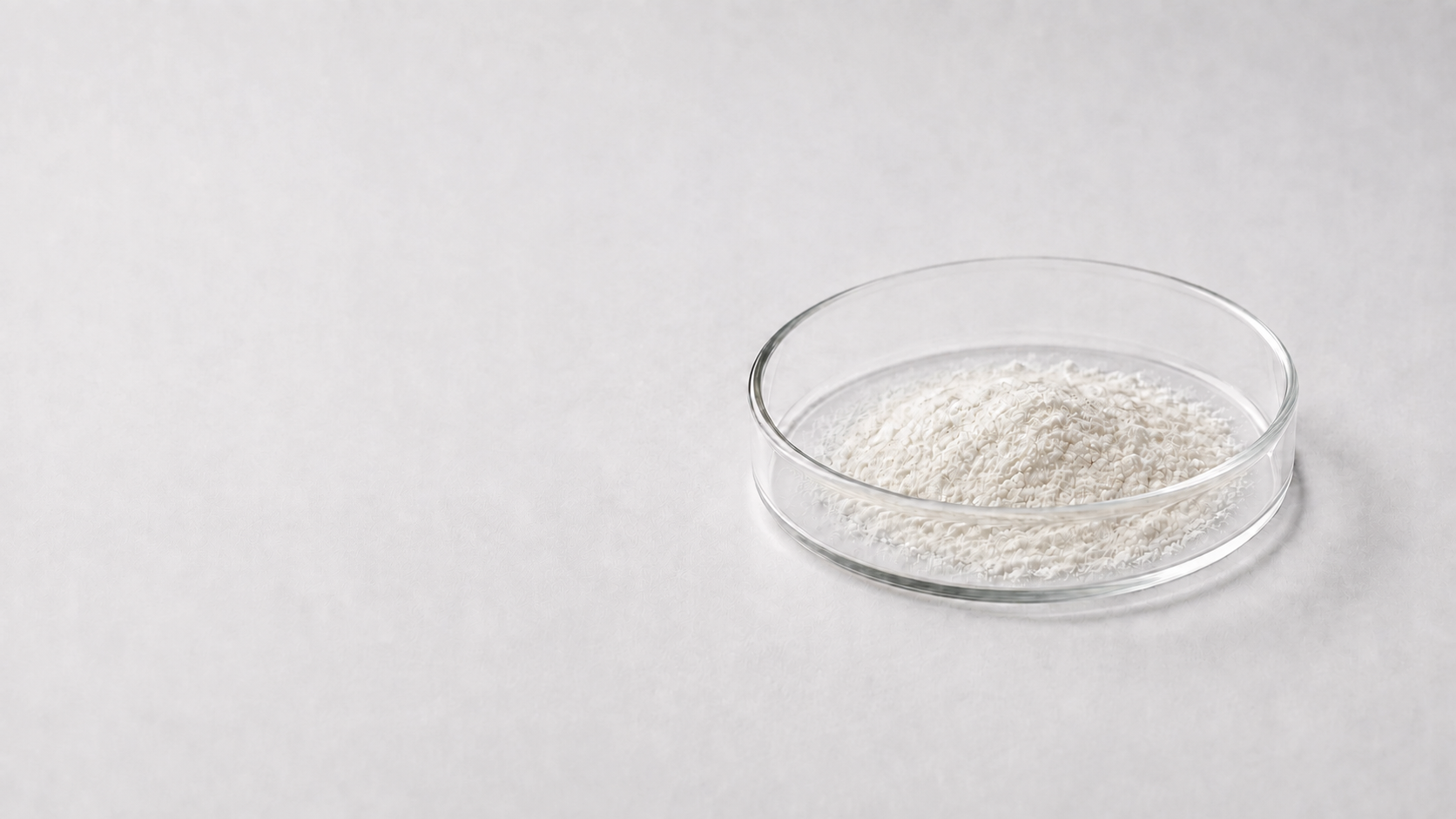 AI illustration of powder in a glass dish; not an actual product batch.